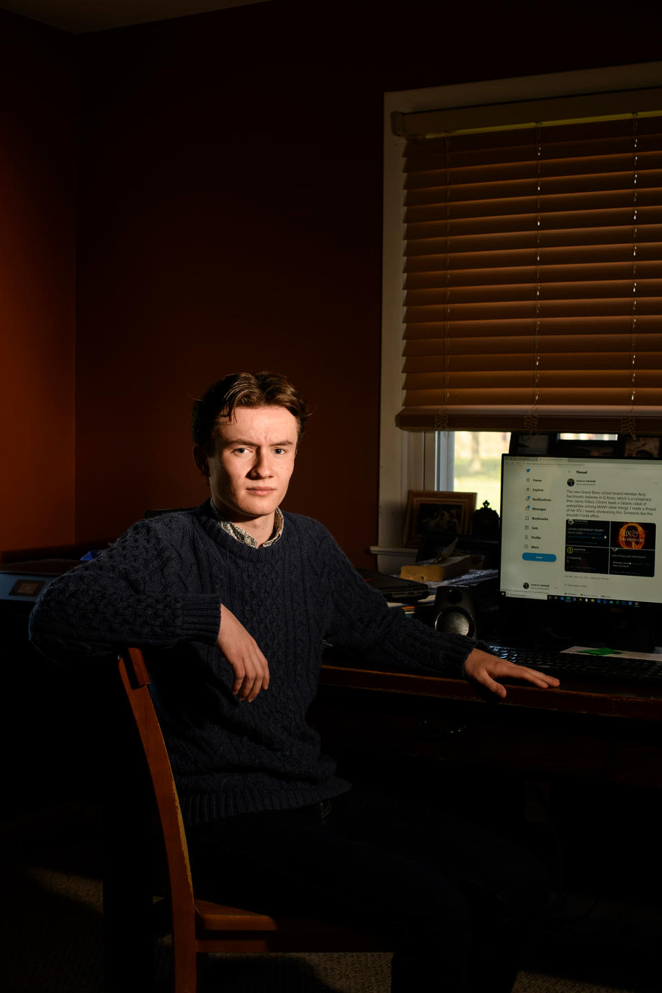 Lucas Hartwell, a senior at Grand Blanc Community High School, in the room he uses as his work space in Grand Blanc, Mich.<span class="copyright">Brittany Greeson for TIME</span>