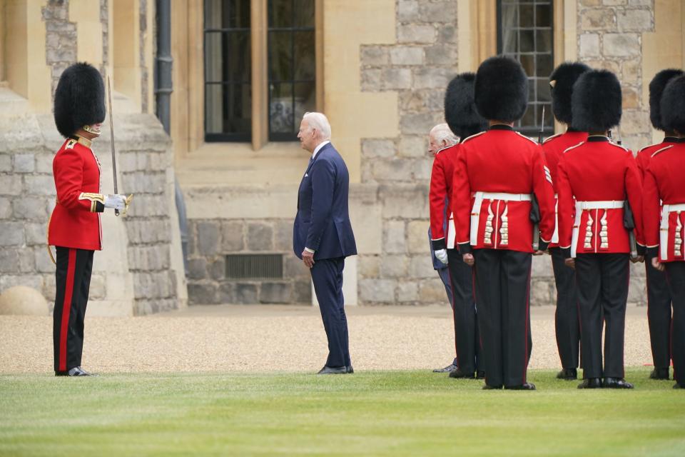 King Charles III and US President Joe Biden inspect the Guard of Honour (PA)