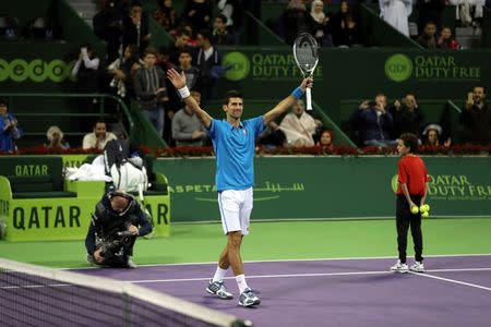 Tennis - Qatar Open - Men's Singles - Novak Djokovic of Serbia v Radek Stepanek of Czech Republic - Doha, Qatar - 5/1/2017 - Djokovic celebrates after winning. REUTERS/Ibraheem Al Omari