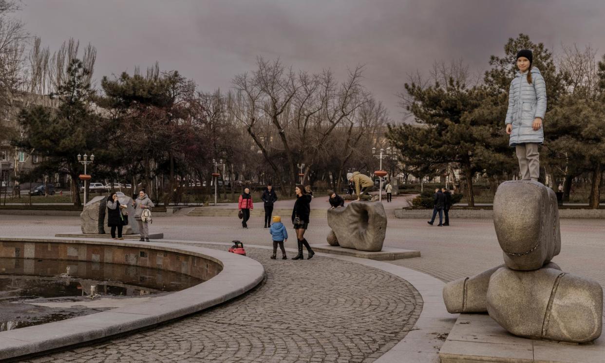 <span>Children playing by a fountain near Sobornyi Avenue in the centre of Zaporizhzhia. </span><span>Photograph: Kasia Stręk/The Guardian</span>