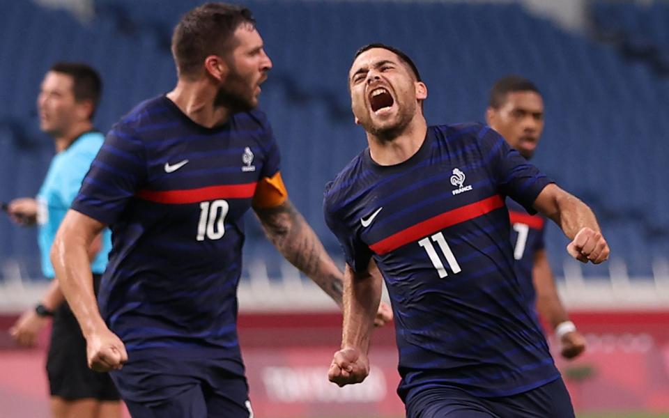 Teji Savanier of France celebrates scoring their fourth goal with Andre-Pierre Gignac of France  - REUTERS/Molly Darlington