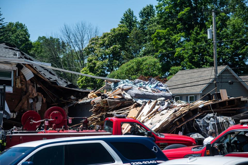 First responders assemble outside of 504 Salt Point Turnpike in Poughkeepsie after a truck struck the building on Monday, June 20, 2022.