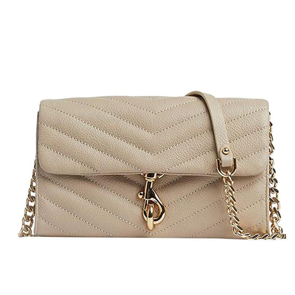 <p><strong>Rebecca Minkoff</strong></p><p>amazon.com</p><p><strong>$164.96</strong></p><p><a href="https://www.amazon.com/dp/B086X2PTFX?tag=syn-yahoo-20&ascsubtag=%5Bartid%7C10049.g.34329922%5Bsrc%7Cyahoo-us" rel="nofollow noopener" target="_blank" data-ylk="slk:Shop Now;elm:context_link;itc:0;sec:content-canvas" class="link ">Shop Now</a></p><p>Featuring a stylish chain strap and designated spots for cash, cards, and coins, Rebecca Minkoff's Edie style has the look of a purse, but the functionality of a wallet. An easy and aesthetically appealing way to minimize the bulk. </p>