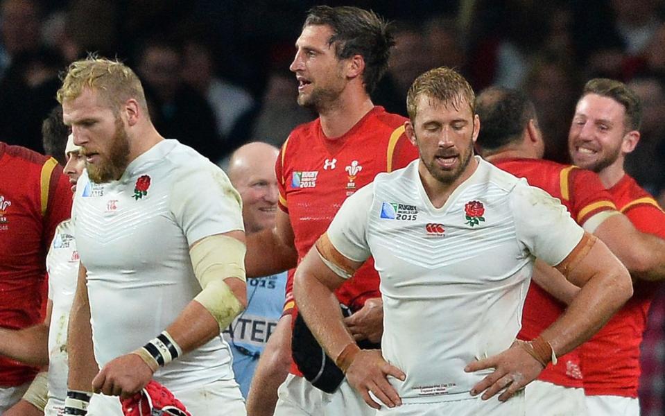 England's flanker Chris Robshaw (R) and England's back row James Haskell react following thier Pool A match of the 2015 Rugby World Cup between England and Wales at Twickenham - James Haskell lifts lid on England's disastrous 2015 World Cup and lambasts leadership skills of Stuart Lancaster - GETTY IMAGES