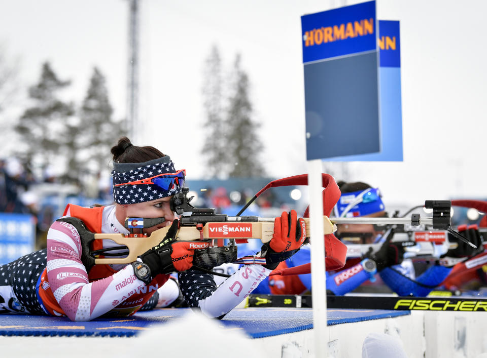 FILE - Joanne Reid, of the United States, shoots during the women's 4x6 km relay competition at the IBU World Biathlon Championships in Oestersund, Sweden, March 16, 2019. The United States Biathlon national champion was sexually harassed and abused for years by a ski-wax technician while racing on the sport's elite World Cup circuit, investigators found. When the two-time Olympian complained, Reid said she was told his behavior was just part of the male European culture. (Jessica Gow/TT via AP, File)
