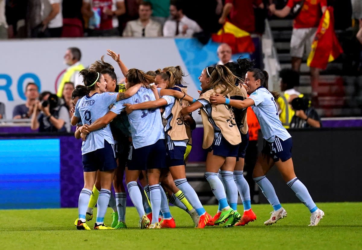 Spain celebrate their victory over Denmark which sealed their quarter-final spot (John Walton/PA). (PA Wire)