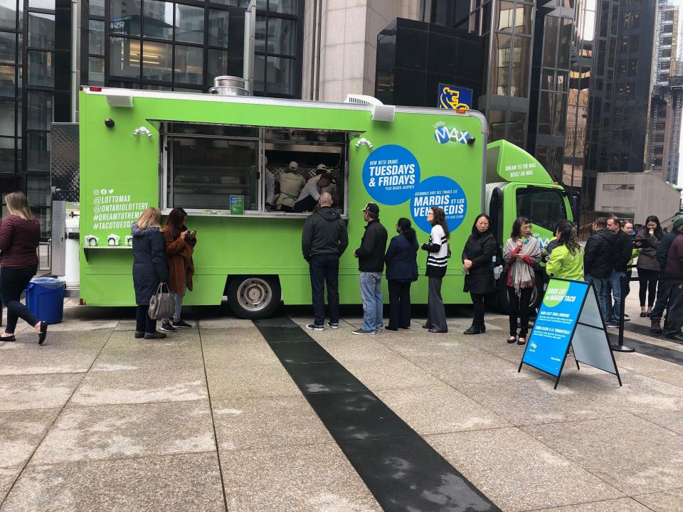 Toronto chef Matt “Fidel Gastro” Basile handing out tacos on the Lotto Max “Let’s Taco-bout Tuesdays” truck in Toronto.