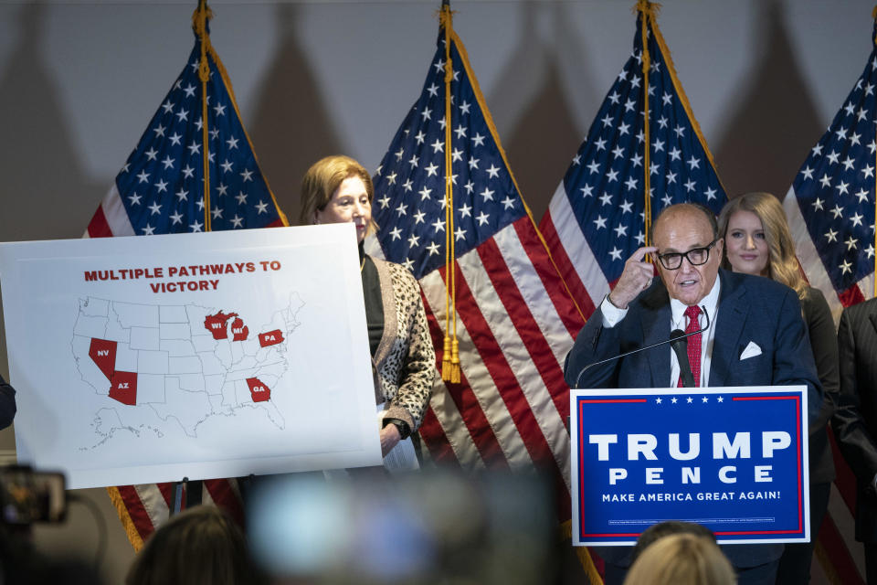 Rudy Giuliani speaks to the press about various lawsuits related to the 2020 election,  inside the Republican National Committee headquarters on November 19, 2020 in Washington, DC.  / Credit: Drew Angerer / Getty Images