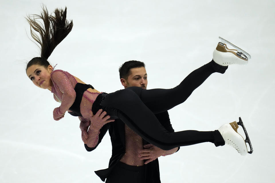 Great Britain's Lilah Fear and Lewis Gibson practice ahead of the ISU Grand Prix of Figure Skating in Beijing, Wednesday, Dec. 6, 2023. (AP Photo/Ng Han Guan)