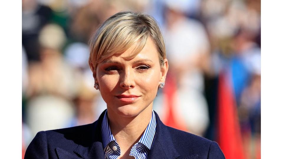 Princess Charlene of Monaco smiling in the sunshine