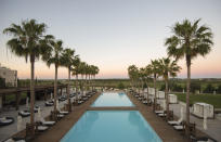<p>The Algarve is usually booked up for the summer – but there’s still a chance to snag a deal to this sun-drenched resort. The <a rel="nofollow noopener" href="http://vilamoura.anantara.com/" target="_blank" data-ylk="slk:Anantara Vilamoura Algarve Resort" class="link ">Anantara Vilamoura Algarve Resort</a> is new for this year, and will allow you to relax as soon as you step into its luxurious grounds. Sip champagne beside its pool, lined with stalk-skinny palm trees, play a round of golf or explore the surrounding olive groves and wineries. Save £280 per person on seven nights half-board, which now costs from £1,155 per person, including flights on September 20 and private transfers. Quote 1052197.<br><i>[Photo: Inspiring Travel Co]</i> </p>
