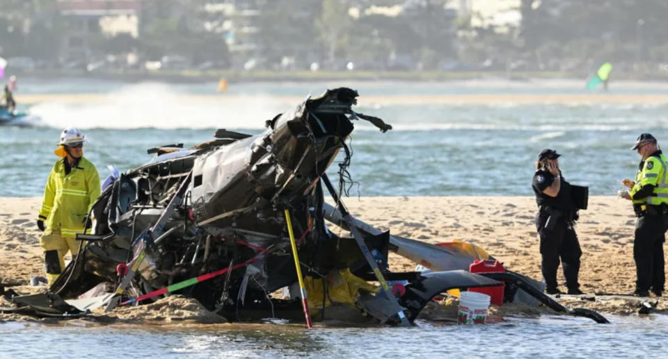 The crashed helicopter on the beach.