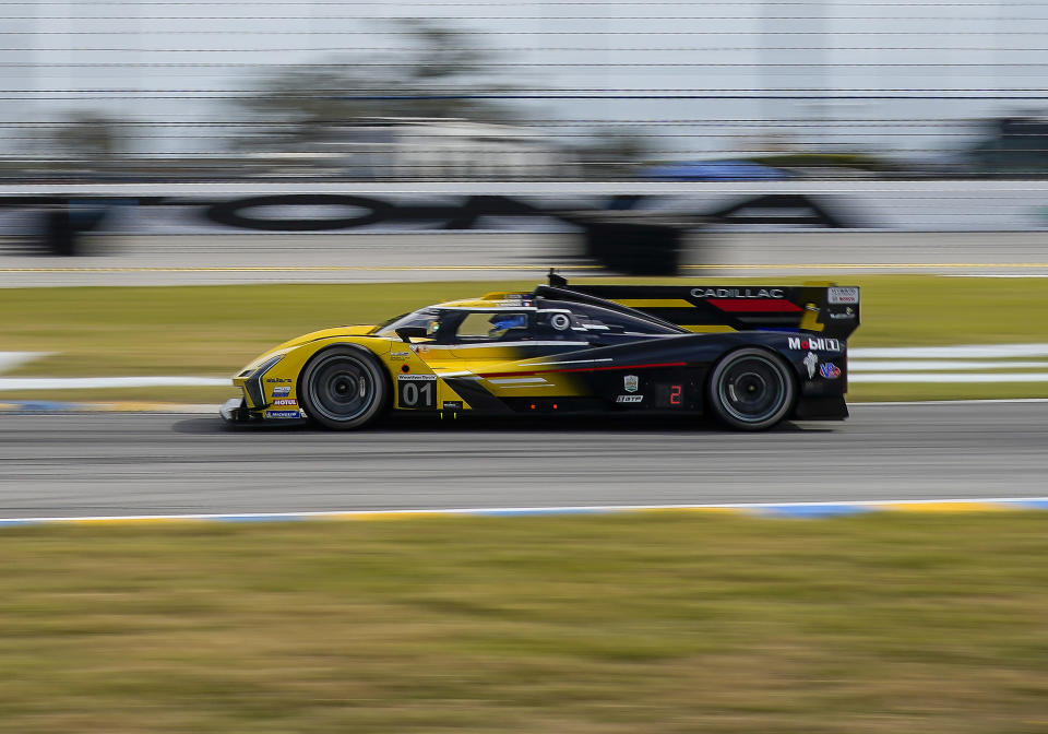 DAYTONA, FL - JANUARY 28: 3rd place in GTP Chip Ganassi Racing driver Sebastien Bourdais, Renger van der Zande, Scott Dixon (01) of GTP, Cadillac V-LMDh During the 2023 IMSA Rolex 24 at Daytona (Photo by Andrew Bershaw/Icon Sportswire via Getty Images)