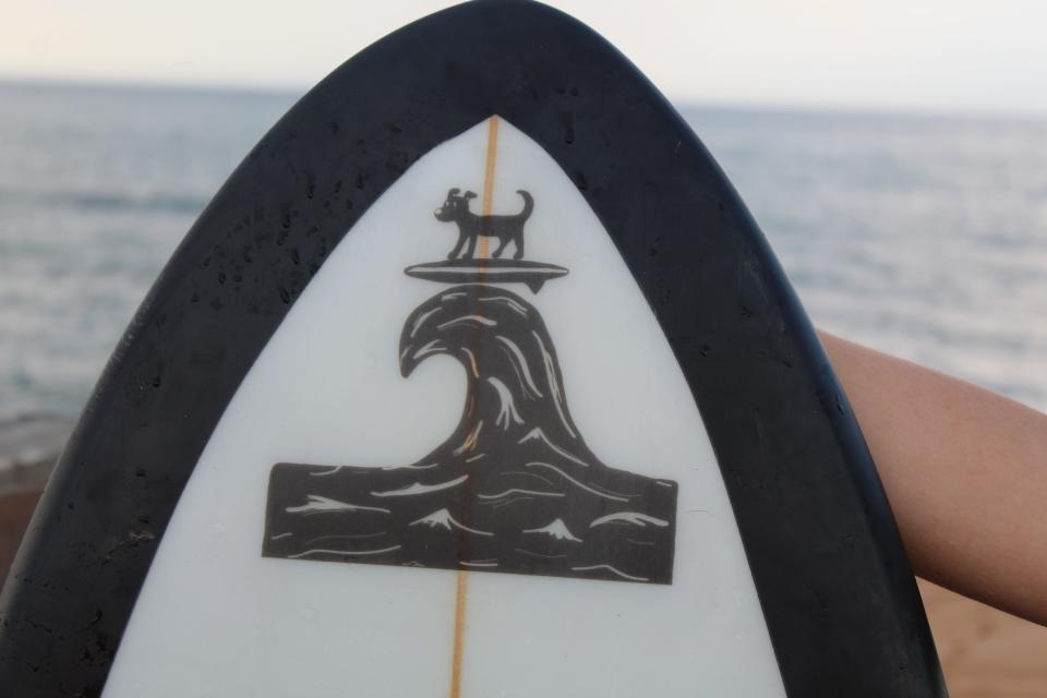 The Hang 8 Dog Surfing event takes place Saturday in Flagler Beach. Pictured is a symbol on the side of the surfboard of a surfing chihuahua named Wednesday.