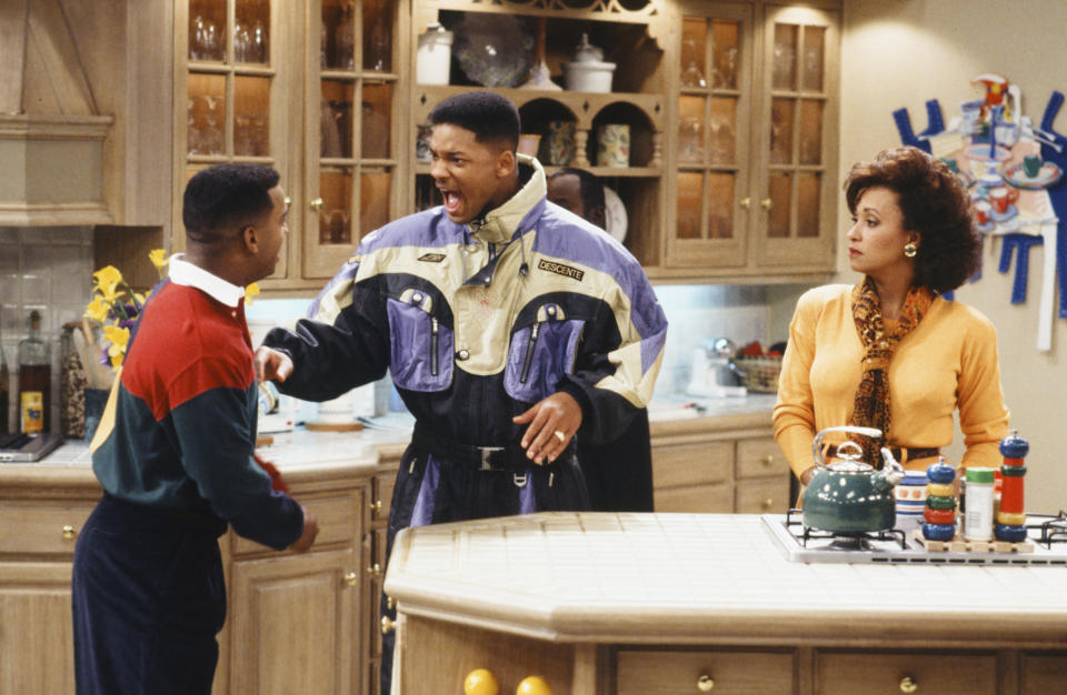 THE FRESH PRINCE OF BEL-AIR -- "When You Hit Upon a Star" Episode 17 -- Pictured: (l-r) Alfonso Ribeiro as Carlton Banks, Will Smith as William 'Will' Smith, Daphne Reid as Vivian Banks  (Photo by Paul Drinkwater/NBCU Photo Bank/NBCUniversal via Getty Images via Getty Images)