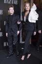 Sharon Stone brings her son Roan Joseph Bronstein to the <i>Harper’s Bazaar</i> Attitude 43 Awards on Tuesday at the Palace of Santona in Madrid, Spain.