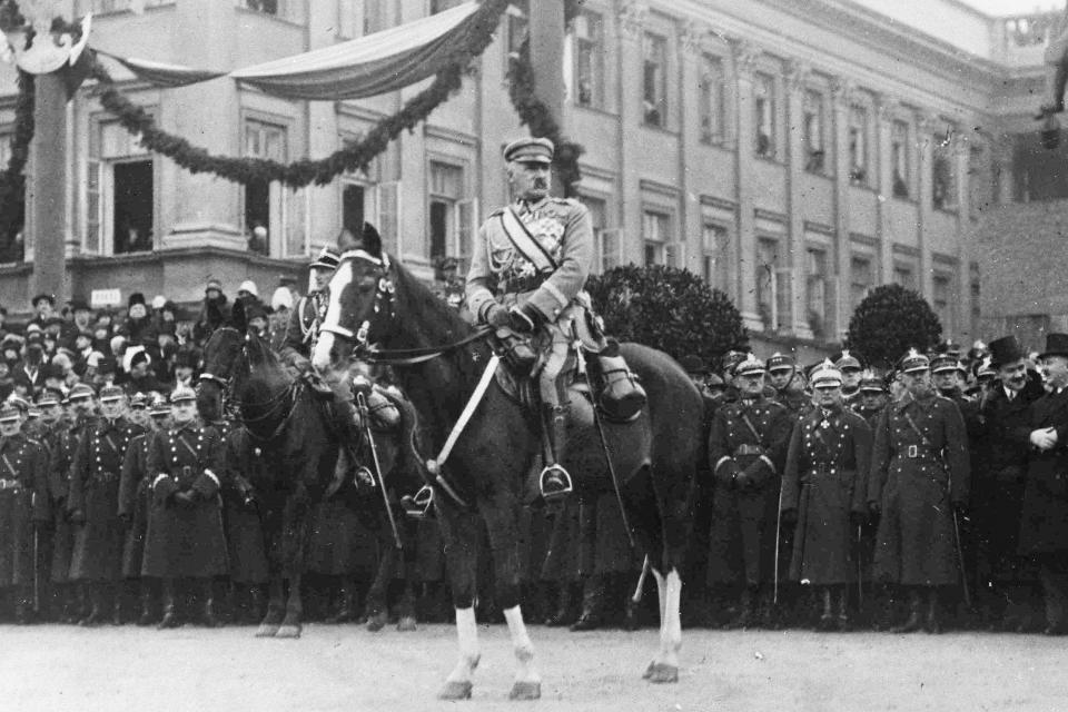 FILE - Polish dictator and military leader Marshal Jozef Pilsudski reviews troops in Warsaw on Nov. 5, 1927. Farsighted, analytical and determined, Pilsudski never managed to fulfill his hope for a Ukraine independent of Russia and connected to Europe. But he did, improbably, wrest his own homeland from the grip of tsarism and from Austria and Prussia. His story is the subject of a new biography, “Józef Pilsudski Founding Father of Modern Poland” by Joshua D. Zimmerman. (AP Photo, File)