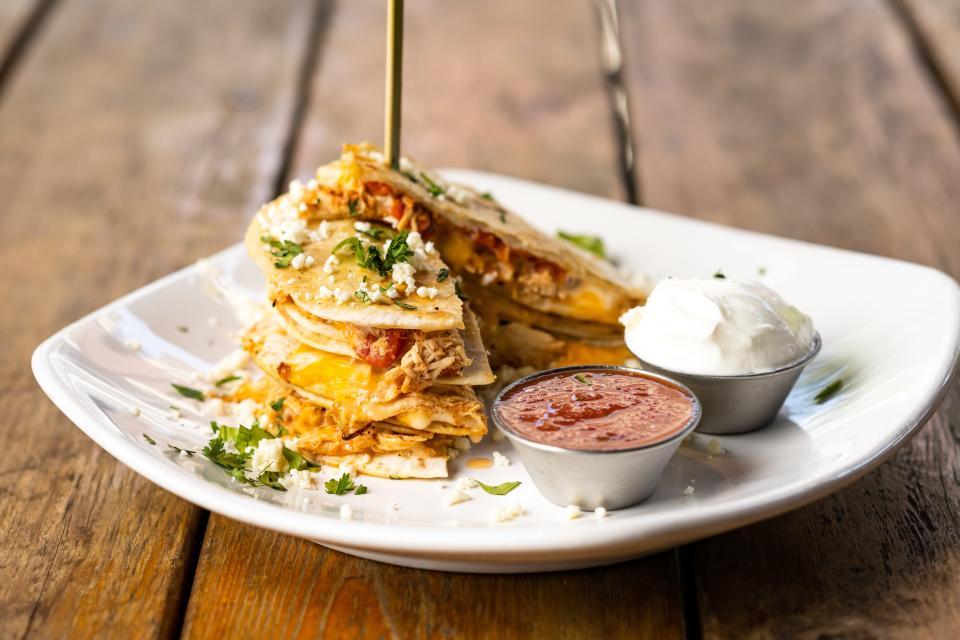 Quesadilla stack is on the menu at DraftKings Sports & Social venue in Troy.