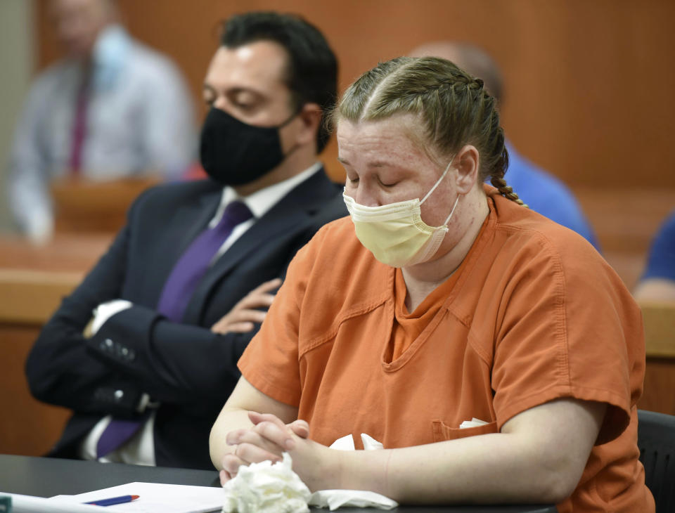 JoAnn Cunningham closes her eyes as a video recording is played during her sentencing hearing Thursday, July 16, 2020, in Woodstock, Ill. Cunningham pled guilty in December to killing her five-year-old son Andrew "A.J." Freund in April 2019 in her Crystal Lake home. (John Starks/Daily Herald via AP, Pool)