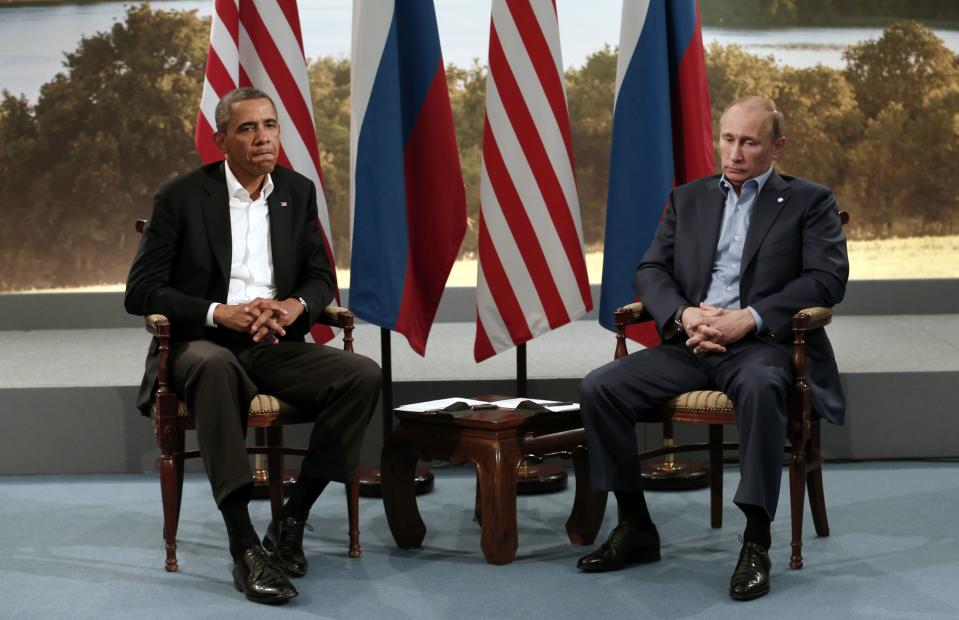 U.S. President Barack Obama (L) meets with Russian President Vladimir Putin during the G8 Summit at Lough Erne in Enniskillen, Northern Ireland, in this June 17, 2013 file photo. To match Special Report UKRAINE-PUTIN/DIPLOMACY REUTERS/Kevin Lamarque/Files (NORTHERN IRELAND - Tags: POLITICS)