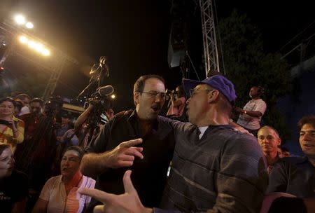 Alejandro Castro Espin (L), 49, son of Cuba's president Raul Castro in Havana in this picture taken December 20, 2014. REUTERS/Enrique de la Osa