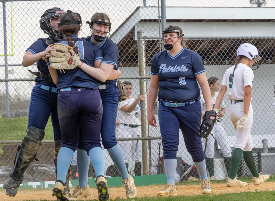 Freehold celebrate after getting the last out to win the game. Freehold Township Softball defeats Colts Neck 3-2 in Colts Neck on April 15, 2024.