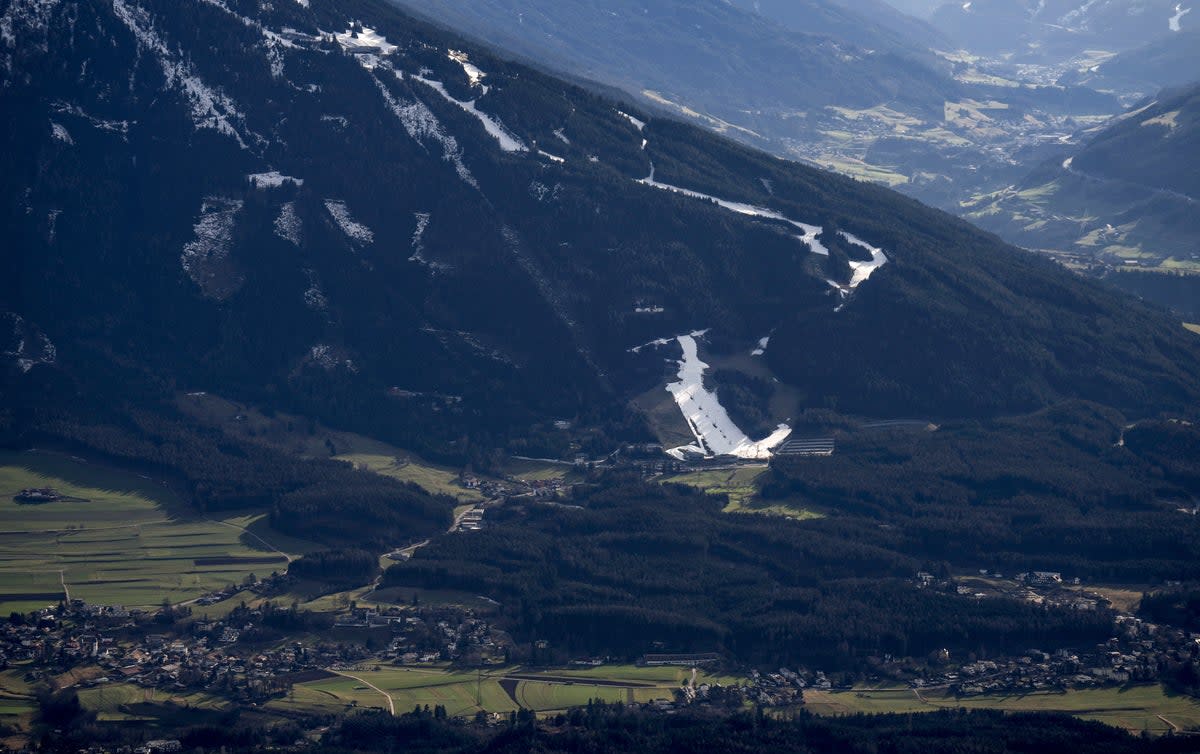 Popular ski resorts have been impacted by the unusually warm weather due to a snowfall shortage  (AP)