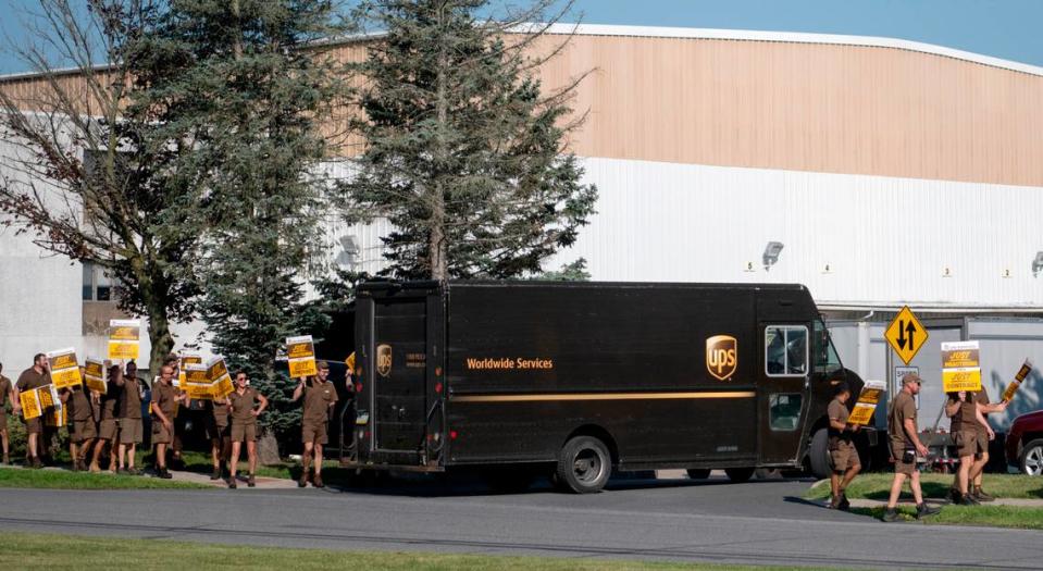 A UPS delivery truck enters the parking lot of the State college UPS Customer Center as local UPS workers from the 764 Teamsters union practiced picketing on Thursday, July 13, 2023.