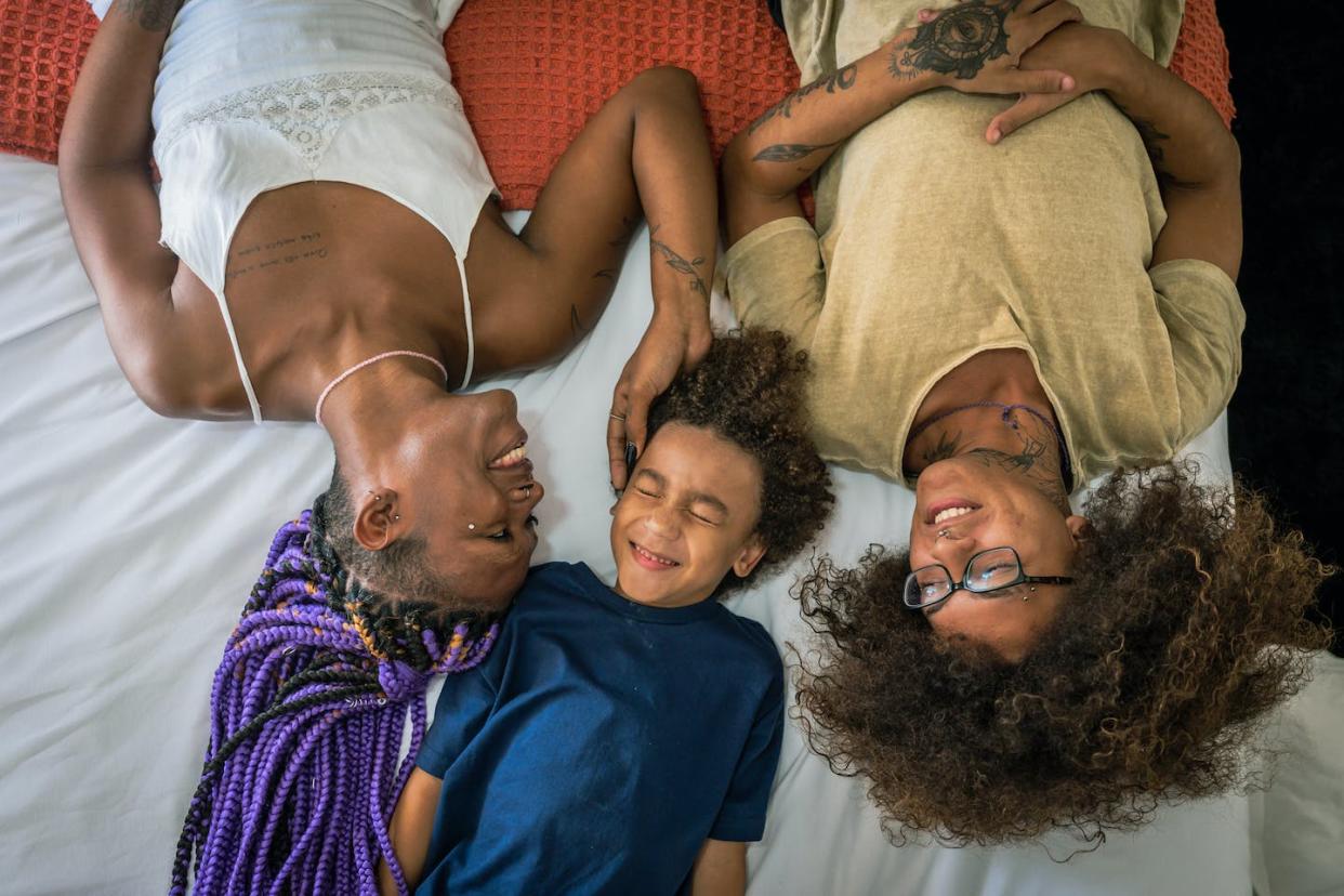 Some trans people find gender euphoria in being mothers and being with family. <a href="https://www.gettyimages.com/detail/photo/family-having-fun-at-home-royalty-free-image/1388504287" rel="nofollow noopener" target="_blank" data-ylk="slk:rparobe/E+ via Getty Images;elm:context_link;itc:0;sec:content-canvas" class="link ">rparobe/E+ via Getty Images</a>