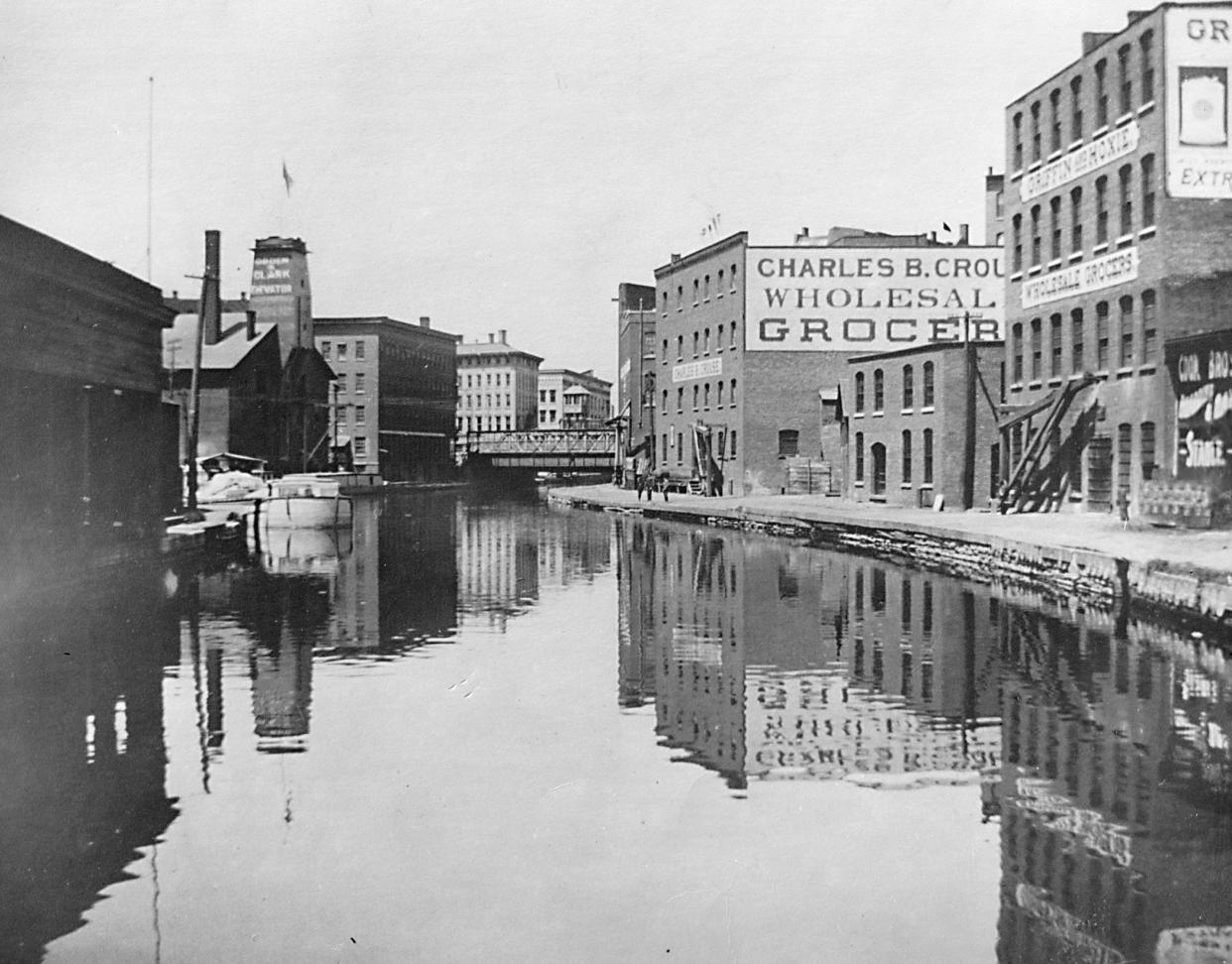 ​​​​​​​It is the turn of the 20th century and you are standing in front of what is today the Observer-Dispatch building and looking west toward Genesee Street. There was no Oriskany Street at the time and, instead, there was the old Erie Canal.  The canal occupied the site for more than 100 years – 1819 to about 1925 – until it was abandoned, filled in, paved and named Oriskany Street. The canal contributed much to the early growth and development of the Upper Mohawk Valley Region from Rome to Utica to Little Falls. In 1825, when the full length of the 353-mile long canal was opened, more than 42 boats a day passed through the region.  By the season’s end, more than 40,000 people had passed through the area.