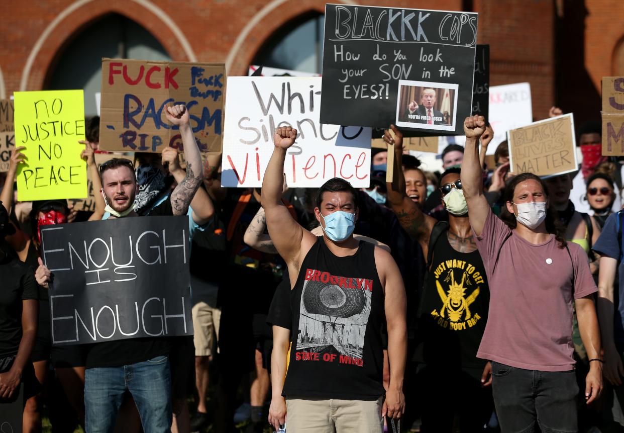 A wave of Black Lives Matter protests and demonstrations were held across the world in 2020, demanding an end to police brutality and racial injustice after several unarmed Black people, including George Floyd, Ahmaud Arbery and Breonna Taylor, were killed by the police.