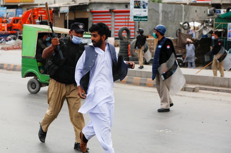 Supporters of the Tehreek-e-Labaik Pakistan (TLP) Islamist political party protest against the arrest of their leader, in Peshawar