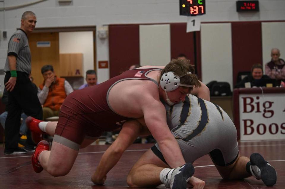 State College’s Nick Pavlechko looks to finish off a takedown of Hollidaysburg’s Wyatt Maines in their 285-pound PIAA Class 3A Northwest Regional final match on Saturday, Feb. 24, 2024 in Altoona. Pavlechko pinned Maines in 59 seconds.