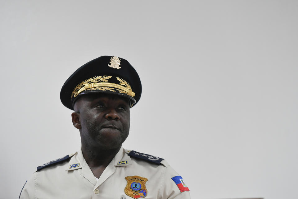 Haiti's Police Director General Leon Charles listens to a reporter's question during a news conference at police headquarters, in Port-au-Prince, Haiti, Thursday, July 15, 2021. Charles denied a report from Caracol news, a Colombian-based private TV station, that interim Prime Minister Claude Joseph was the mastermind behind the July 7th assassination of Haitian President Jovenel Moise. (AP Photo/Matias Delacroix)