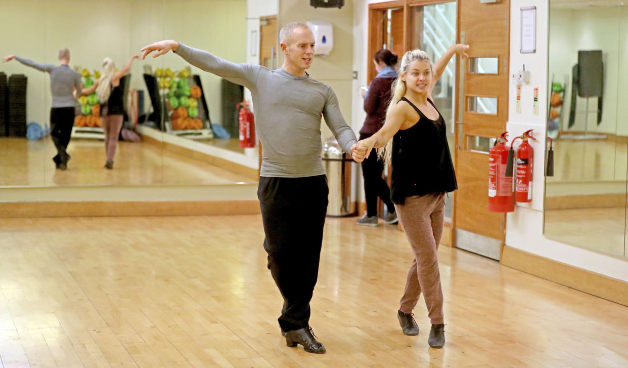 Judge Robert Rinder and Oksana Platero rehearse in a dance studio in Manchester.