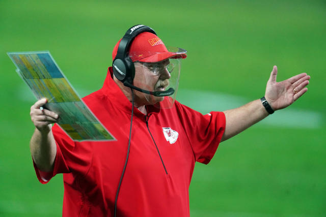 Kansas City Chiefs head coach Andy Reid looks at a replay during