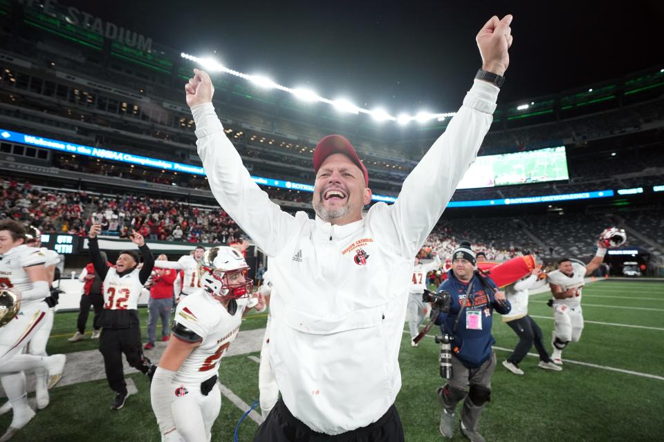 Don Bosco vs. Bergen Catholic in the Non-Public A football championship at MetLife Stadium in East Rutherford on Friday, November 25, 2022. Bergen Catholic head coach Vito Campanile and his team celebrate defeating Don Bosco.