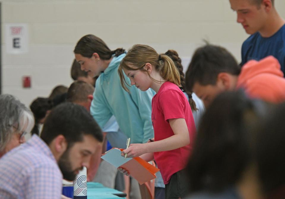 Lexington Junior High students were given a salary and a budget and were required to balance their finances Tuesday morning during the Reality Store program.