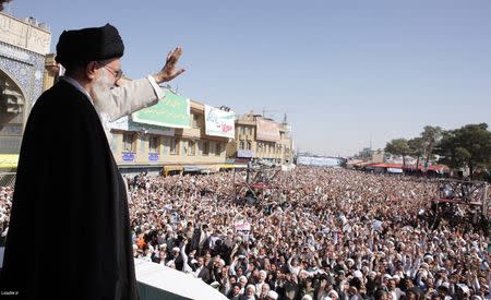 Iran's Supreme Leader Ayatollah Ali Khamenei waves to the crowd in the holy city of Qom, 120 km (75 miles) south of Tehran, October 19, 2010. REUTERS/Khamenei