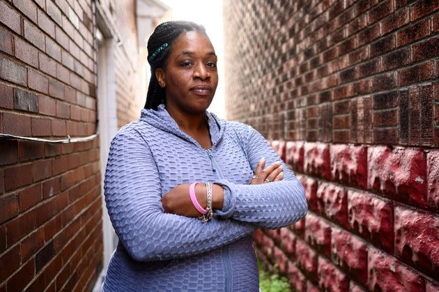 Chartia Worlds, 36, the sister of Christopher Miyares, an unarmed Black man whom John Fetterman pursued after hearing gunfire in 2013, stands near her home in Turtle Creek, Pa., on Oct. 16. She criticizes Fetterman for not apologizing for the mistaken pursuit. (Photo: Justin Merriman for HuffPost)