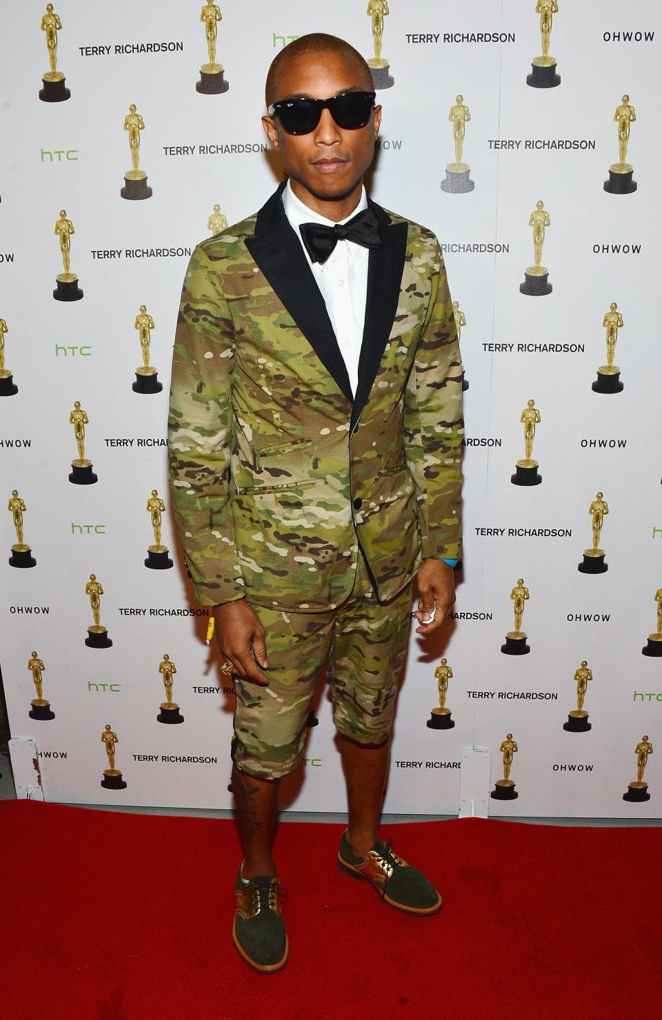 Pharrell Williams attends the OHWOW & HTC celebration of the release of "Terrywood" with Terry Richardson at The Standard Hotel & Spa on December 7, 2012 in Miami Beach, Florida.