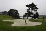 Mark Hubbard hits from a bunker to the 15th green during practice for the PGA Championship golf tournament at TPC Harding Park in San Francisco, Tuesday, Aug. 4, 2020. (AP Photo/Jeff Chiu)