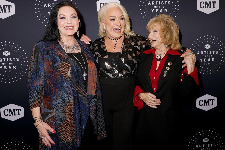 NASHVILLE, TENNESSEE - OCTOBER 14: (L-R) In this photo released on October 14, 2022, Peggy Sue Wright, Tanya Tucker and Crystal Gayle attend the 2022 CMT Artists of the Year at Schermerhorn Symphony Center on October 12, 2022 in Nashville, Tennessee. (Photo by Brett Carlsen/Getty Images for CMT)
