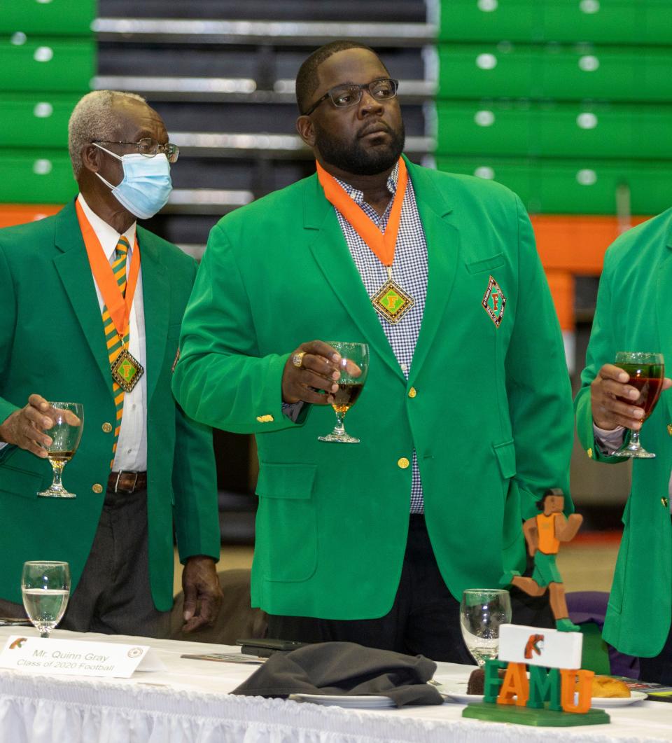 Former Rattlers quarterback and newly-enshrined FAMU Sports Hall of Famer Quinn Gray stands for a toast during the induction ceremony on Friday, Sept. 10, 2021. Gray is now the quarterbacks coach at Alcorn State University.