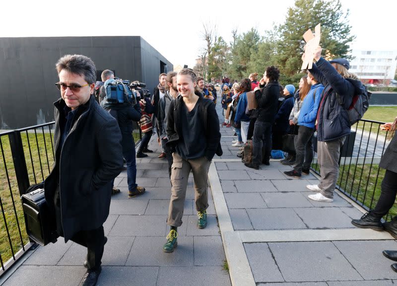 Activists and lawyers at the District Court of West Lausanne before the trial of twelve activists for a protest inside a branch of Credit Suisse bank in 2018 in Renens