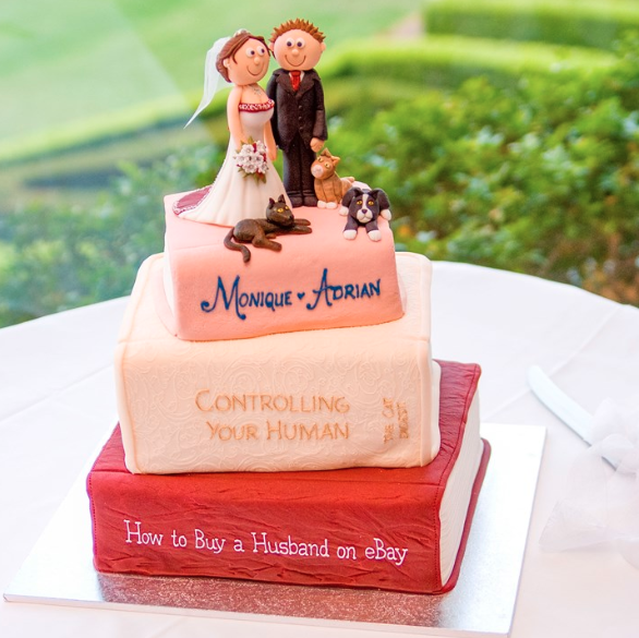 In an adorable nod to how their relationship started, the pair decided to have a personalised wedding cake made in the shape of a stack of books. Photo: Monique Frankel