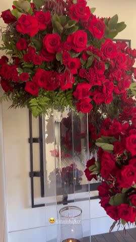 <p>Kourtney Kardashian/Instagram</p> Kourtney Kardashian displays red roses sent by Travis Barker