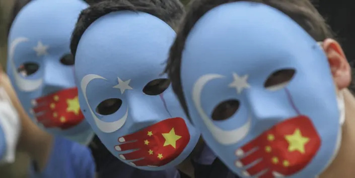 Activists hold a demonstration against China's policies towards Uyghur Muslims in Jakarta, Indonesia on January 4, 2021.