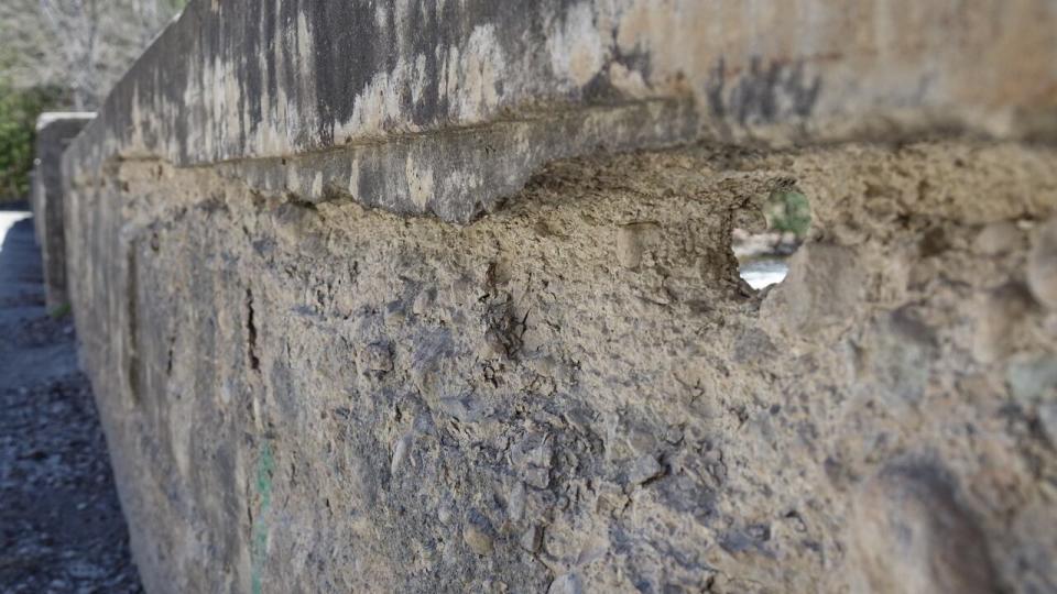 A section of the Lost Channel Bridge in Tweed, Ont. is so damaged a hole offers a view of the rapids below.