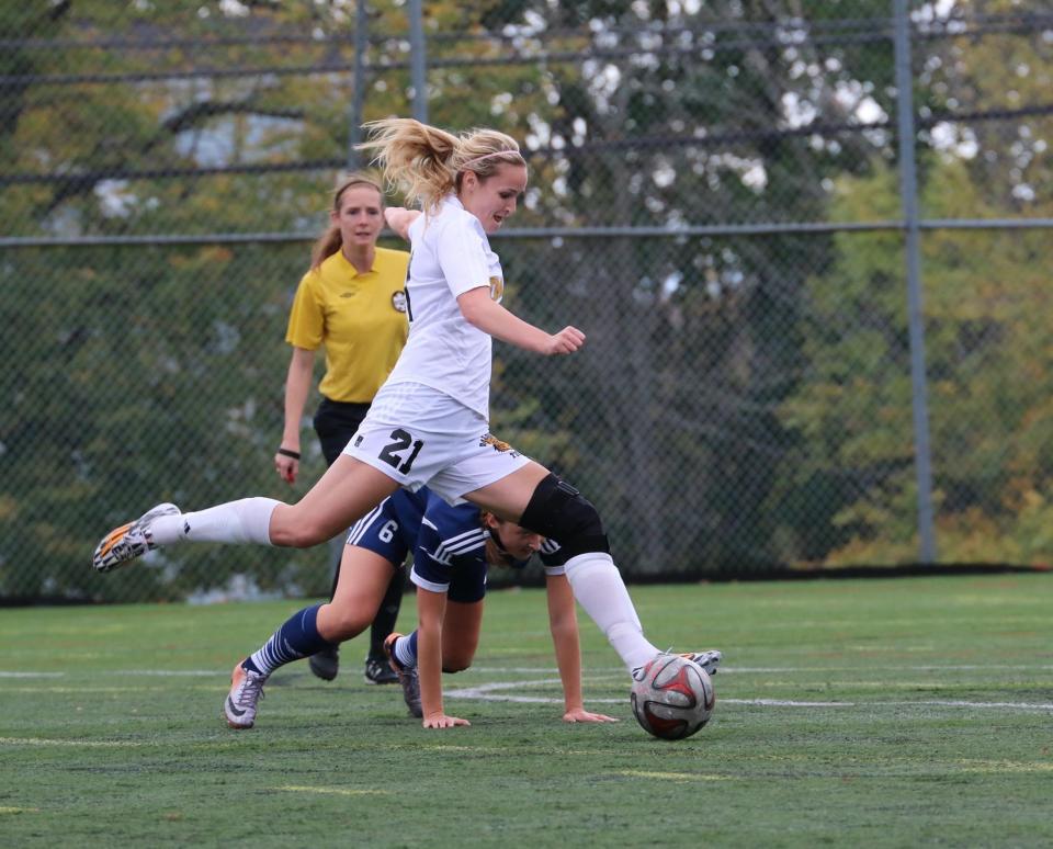 Doriana Homerski playing for the Dalhousie Tigers. Homerski was a high-level athlete prior to contracting COVID-19. Now, she can barely walk around her block in Hamilton, Ont. (Image provided by Doriana Homerski) 